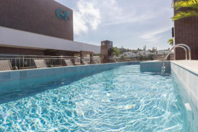 Porto Madero 202 - Moderno Apto em Condomínio com Piscina no Rooftop, Bombinhas